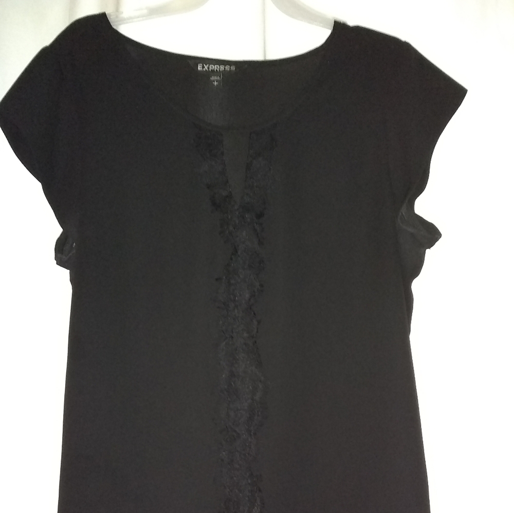 Express ladies pullover blouse. Satin feel.